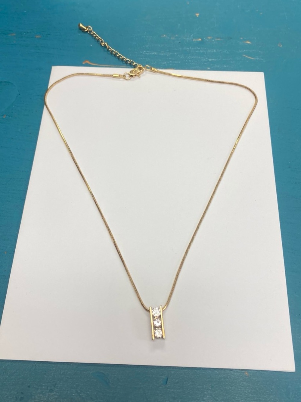 Gold Tone Vertical Bar Pendant Necklace with Clear Cubic Stones